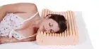 Height adjustable contoured medium density memory foam pillow