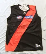 #LL. AFL ESSENDON JERSEY TO TIMOR PEACE KEEPING TROOPS, SIGNED