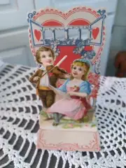 VINTAGE DIECUT FOLDOUT VALENTINE CARD BOY AND GIRL PRINTED IN GERMANY