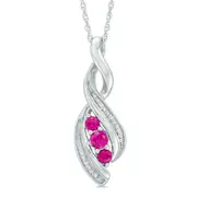 Lab-Created Ruby and Diamond Accent Cascading Three Stone Pendant in Sterling Silver