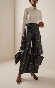 [A.W.A.K.E. MODE] Faux Leather Studded Flared Leg Pants