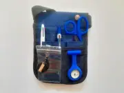 BLUE NURSING KIT POUCH + ACCESSORIES. POUCH, SHEARS, FOB, TORCH, PEN , ID TAG.