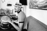 Philadelphia 76ers Wilt Chamberlain casual playing bongo drum in h- Old Photo 1