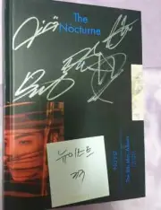 nu'est autographed message album
