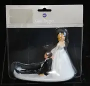 WILTON Now I Have You WEDDING CAKE TOPPER Bride Dragging Groom NEW