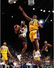 Gary Payton Supersonics UnSigned Hardwood Classic Lay vs Shaquille O'Neal Photo