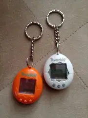 New Tamagotchi 1996 1997 Bandai #1800 Orange & White Virtual Pet 1st Gen +Manual