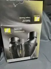 New open box Nikon Travelite compact binoculars 8 X 25 model 036480
