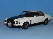 Carlectables 1/18 Holden HX Monaro GTS Sedan Cotillion White MiB