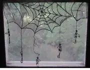 Spider Web w/ Skeletons Door/Window Hanger Black 38in X 36 in Halloween, DOD