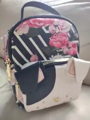Betsey Johnson mini backpack made of faux leather puppy dog, floral print.