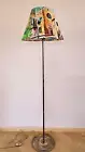 Floor lamp with a printed old town shade for a cozy home decor.