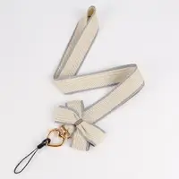 在飛比找ETMall東森購物網優惠-耐用鏈條織帶防丟蝴蝶結手機掛繩