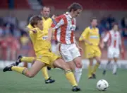 Tom Cowan of Huddersfield Town tackles Gerry McMahon of Stoke City- Old Photo