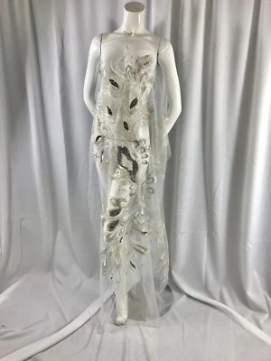 Peacock Feathers Embroider With Sequins And Metallic Tread On A White Mesh Lace.