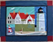 Betsey Bates appliqued lighthouse seascape wall hanging with embroidered accents