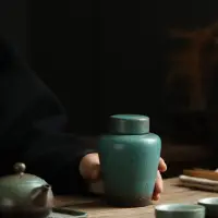 在飛比找Yahoo!奇摩拍賣優惠-“正品”大號密封茶葉罐家用陶瓷茶缸普洱罐裝茶葉包裝盒自吸力窯