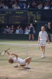 Swedish tennis player Stefan Edberg kneels back on the grass in c - Old Photo 1