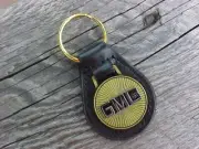 GMC TRUCKS Leather Key Fob Antique Gold Medallion Classy General Motors NOS