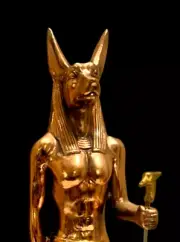 A rare statue of the ancient Egyptian god Anubis standing to protect the dead
