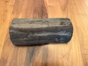 Ebony wood half log, 10 1/2" length, 3 1/4" radius, 5" width at base