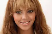 Beyonce Knowles poses for a portrait in a studio at 46664 Give One- Old Photo 5