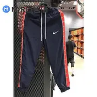 在飛比找Yahoo!奇摩拍賣優惠-Nike 耐吉 春秋男女小勾串標運動褲梭織速干防風收口小腳長