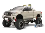 Tamiya 58415 1/10 RC Toyota Tundra Highlift 4X4 Pick-Up Truck Kit w/2 Snowboards