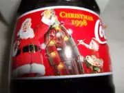 Coca Cola Christmas Bottle 1998 8 oz.Santa & Elf on Bottle Never Opened