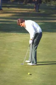 Bruce Lietzke in action, putt during tournament, Pebble Beach, CA - Old Photo