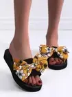 Black Slides with Black & White Floral Design Bow on Marigold