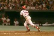 Outfielder Lou Brock St. Louis Cardinals swings and watchs the fli- Old Photo