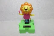 NEW SOLAR POWERED DANCING BOBBLE HEAD SUN CATCHER DANCING LION on UNICYCLE
