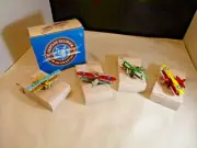 COLLECTOR'S SET OF 4 MINIATURE DIECAST BIPLANES - READERS DIGEST MIB new