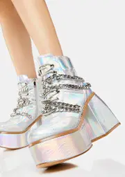 Orbiting Aura Platform Boots