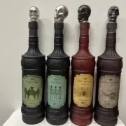 (4 Pack) Halloween Themed Apothecary Bottle- Spider Web, Bat, Bone, Dead Man