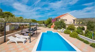 Stunning home in Milna with WiFi, Outdoor swimming pool and Heated swimming pool