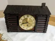 Vtg. log cabin clock; hand made, metal face, quartz movement.