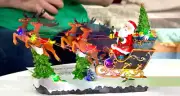 Kringle Express LED Santa in Sleigh with Rotating Christmas Tree Lighted H230361