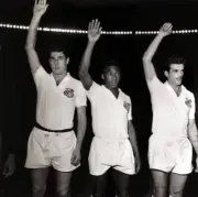 Pele in his club colours of Santos is waving to the crowd with te- Old Photo