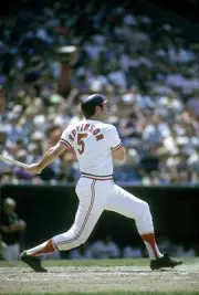 Third baseman Brooks Robinson Baltimore Orioles swings and watche- 1974 Photo