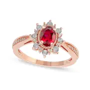 Oval Ruby and 0.10 CT. T.W. Natural Diamond Sunburst Frame Antique Vintage-Style Tapered Shank Ring in Solid 10K Rose Gold