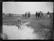 Dr Lee Browne hitting a golf ball out of a sand bunker, NSW, 1924 Old Photo