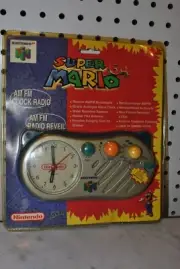 1998 SUPER MARIO 64 AM/FM CLOCK RADIO sealed Nintendo N64 package damage