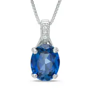 Oval Lab-Created Blue Sapphire and Diamond Accent Pendant in Sterling Silver