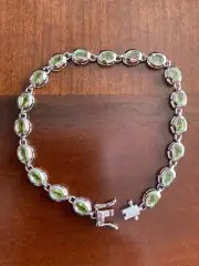 NEW 6.80CTW OVAL MANCHURIAN PERIDOT(TM) STERLING SILVER BRACELET. SIZE 8