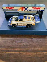 AFX TOMY LIGHTED FRONT AND REAR JAGUAR # 2 SLOT CAR , MINT NEVER BEEN RAN !!!!