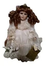 A Connoisseur Collection Porcelain Doll. Celine By Seymour Mann