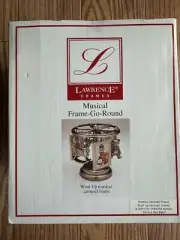 NEW LAWARENCE FRAMES MUSICAL FRAME-GO-AROUND BABY SILVER TONE