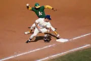 Reggie Jackson Oakland Athletics gets back to first ahead tag by - 1974 Photo